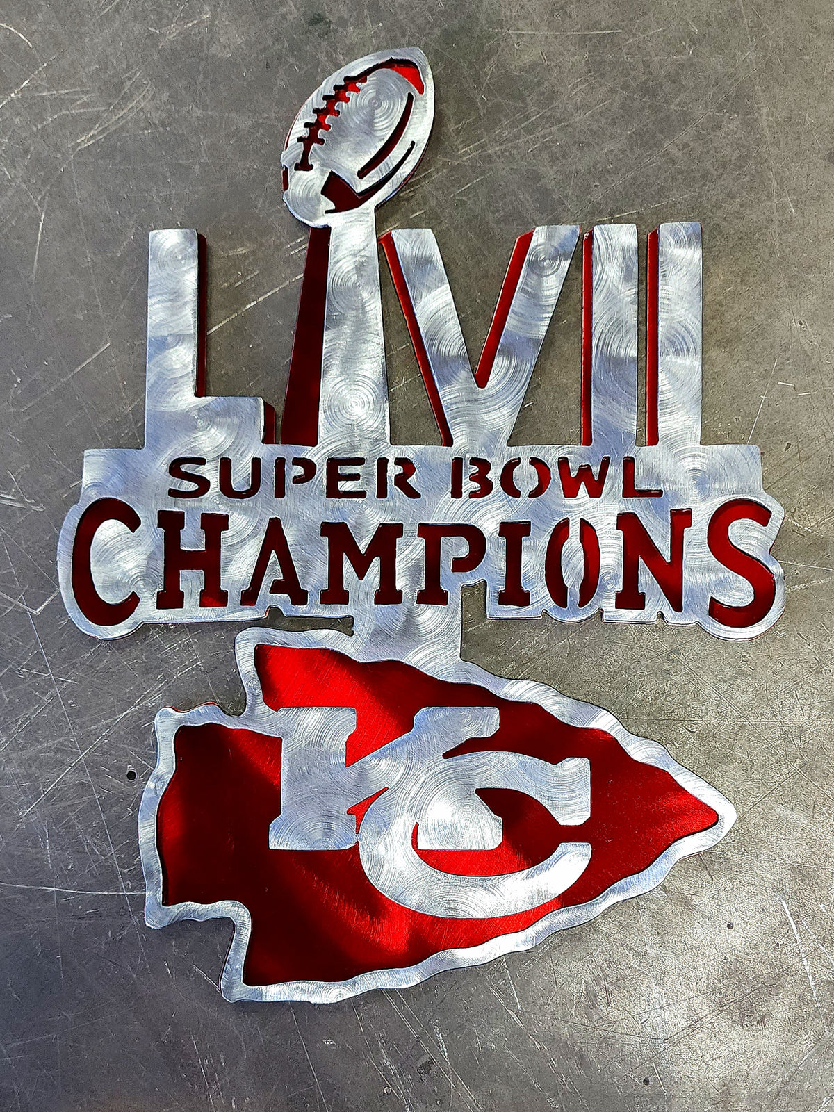 Powder coated sports team metal artwork by Elite Metalworking