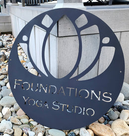 Black powder coated custom metal logo sign for Foundations Yoga Studio
