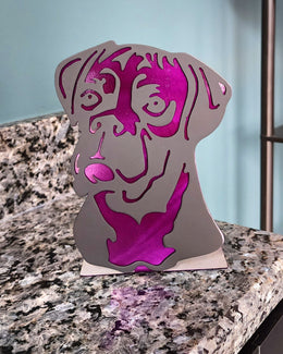Freestanding metal dog portrait displayed on a tabletop base by Elite Metalworking