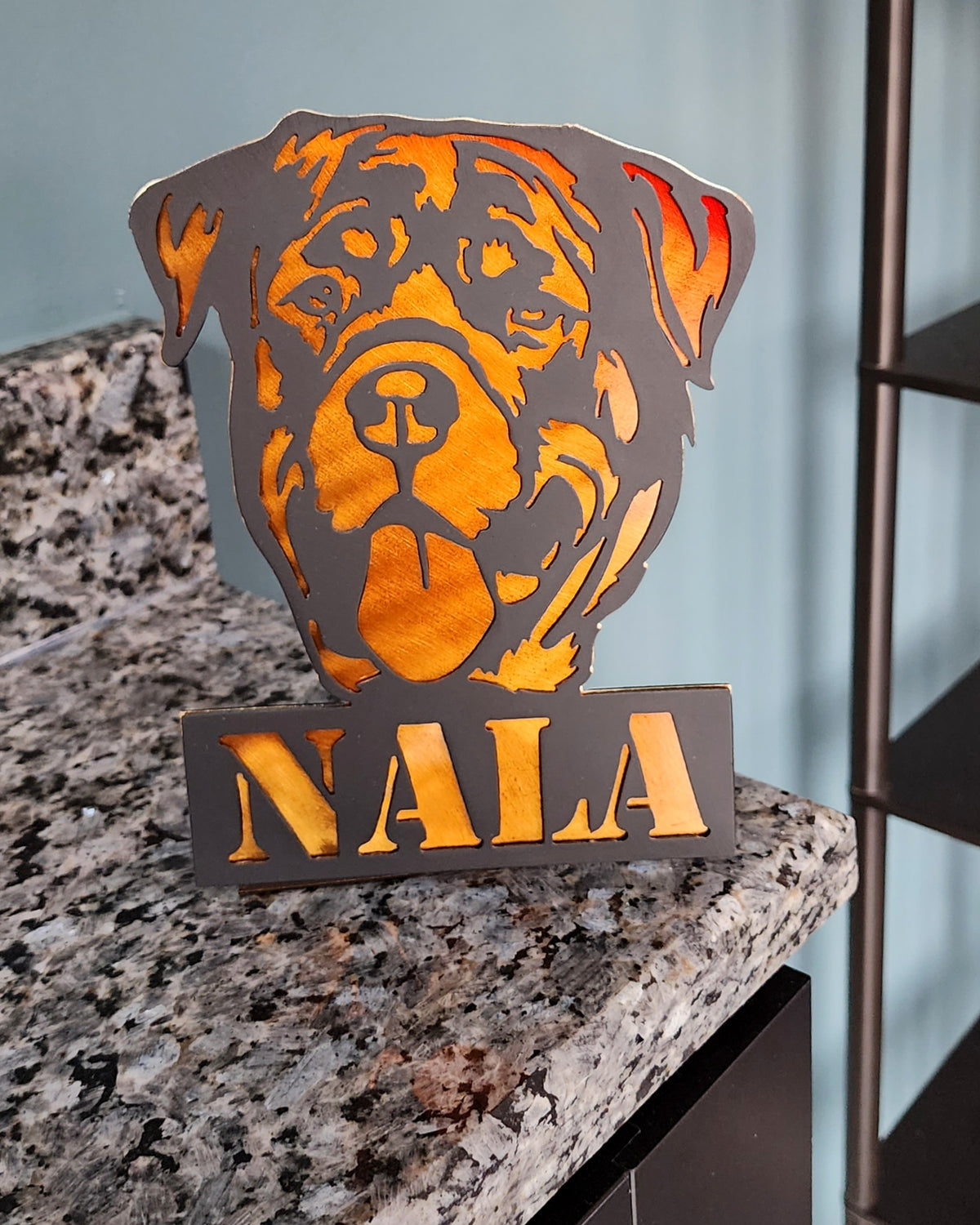 Freestanding metal dog portrait displayed on a tabletop base by Elite Metalworking
