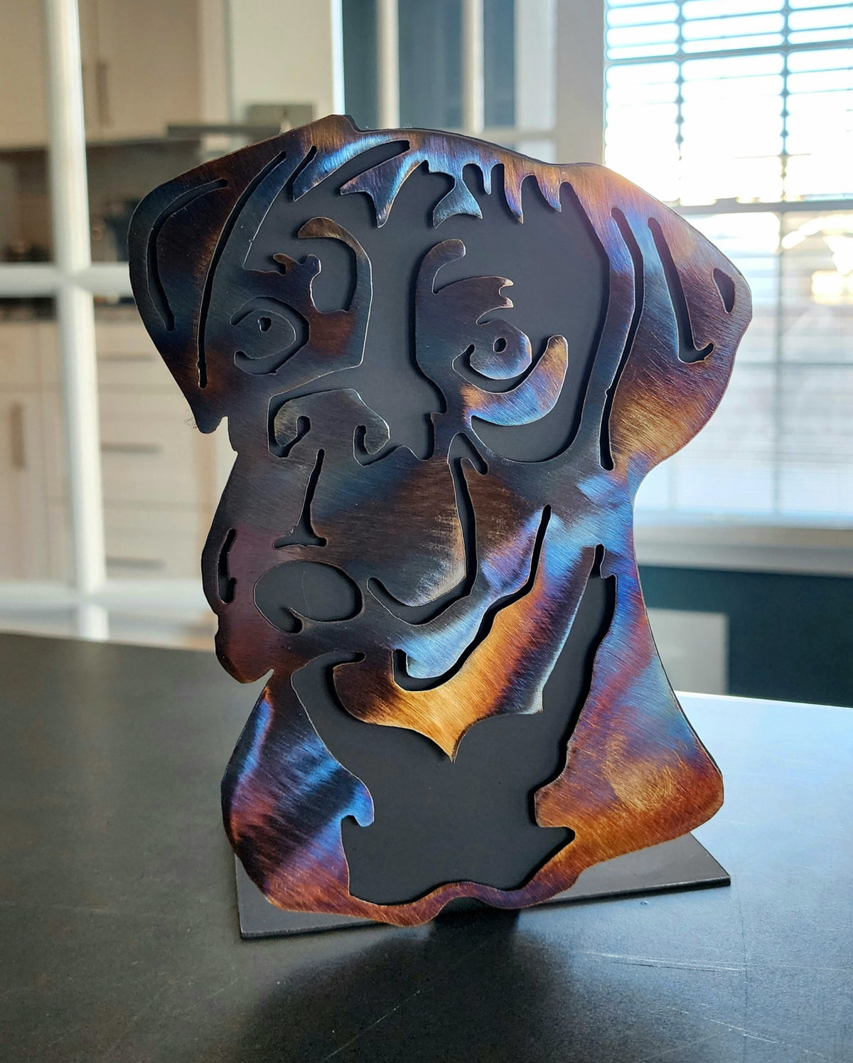 Freestanding metal dog portrait displayed on a tabletop base by Elite Metalworking
