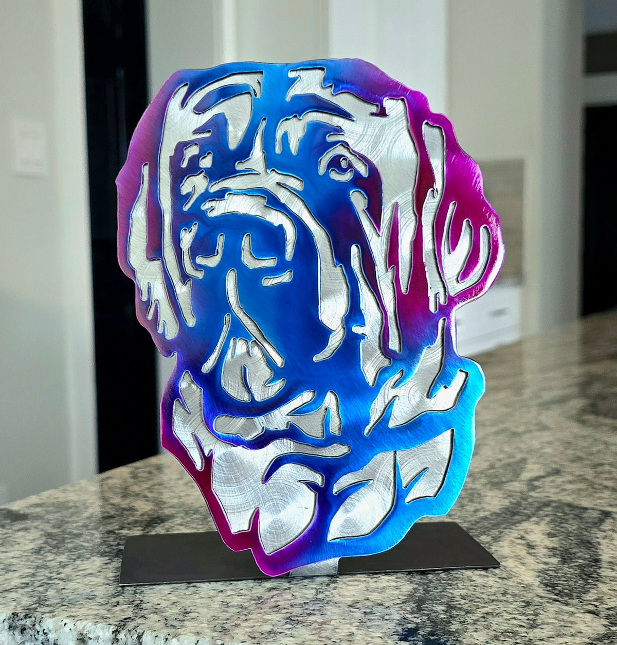 Freestanding metal dog portrait displayed on a tabletop base by Elite Metalworking