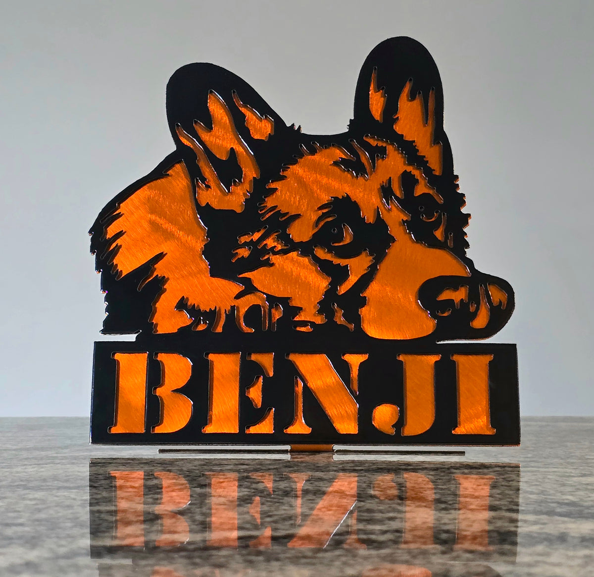 Freestanding metal dog portrait displayed on a tabletop base by Elite Metalworking