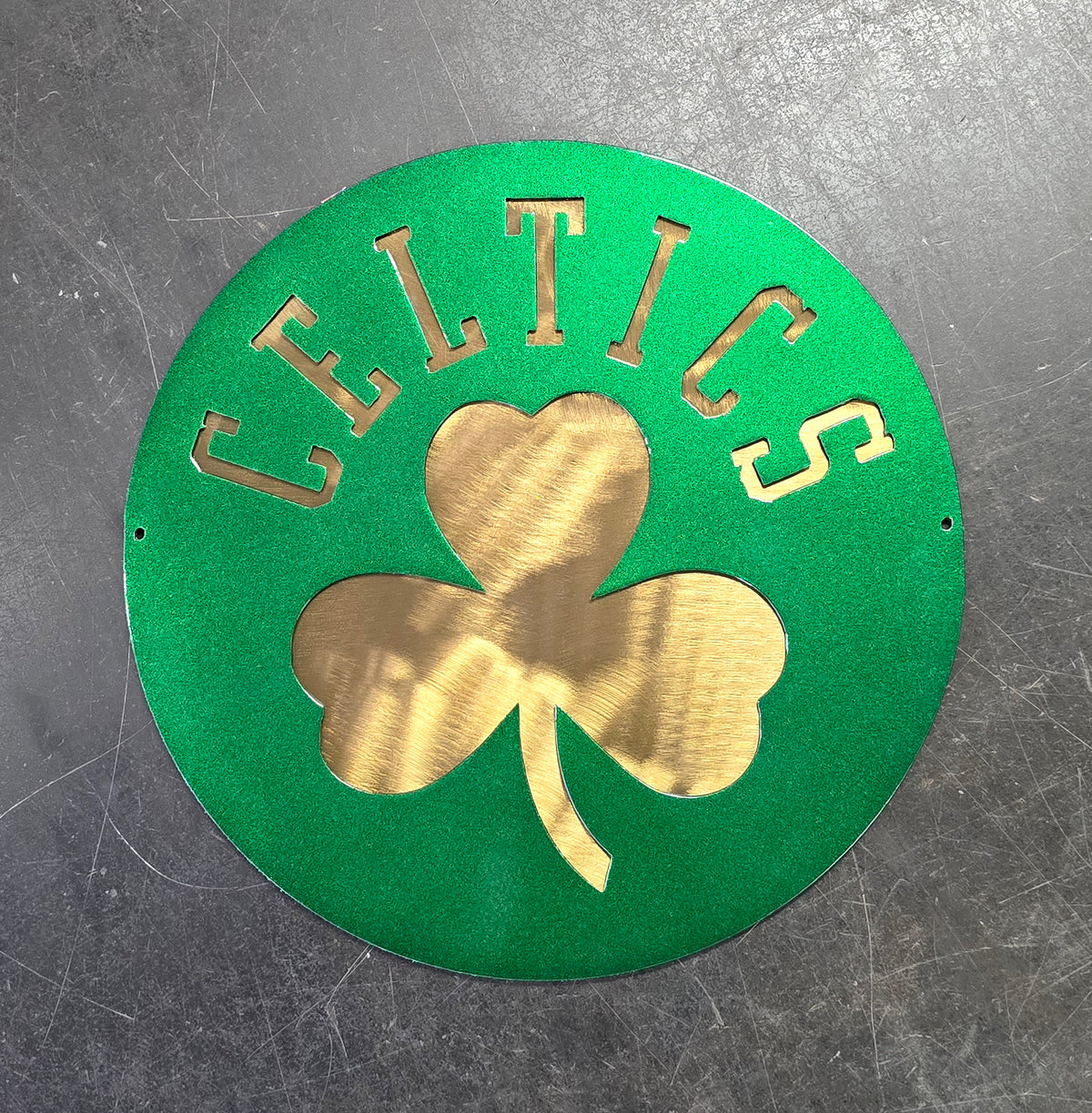Powder coated sports team metal artwork by Elite Metalworking