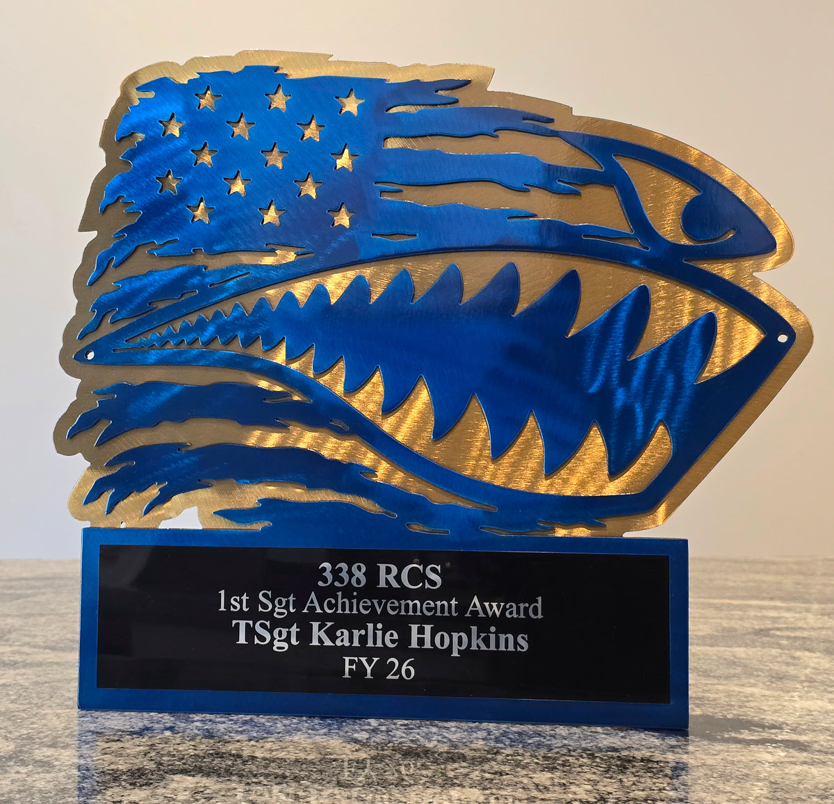 Blue and gold American flag shark-head achievement award by Elite Metalworking