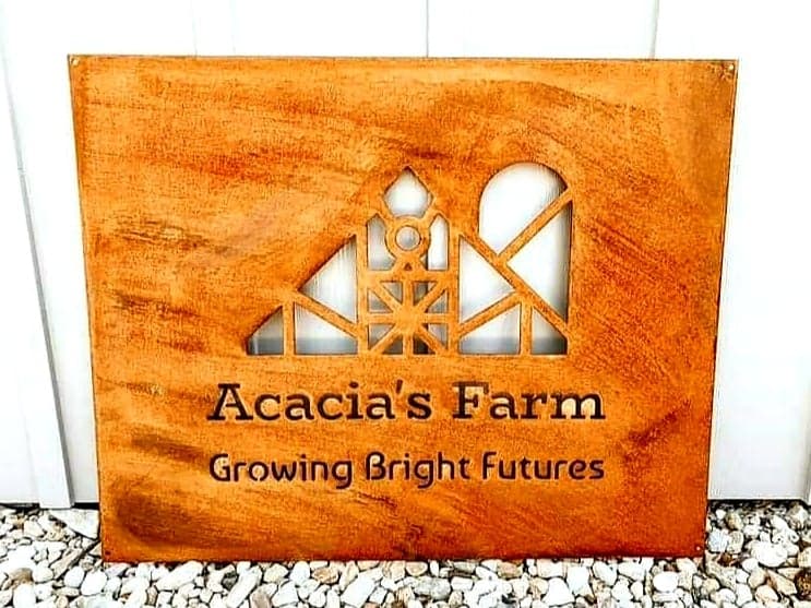 Acacias Farm logo on wood by Elite Metalworking