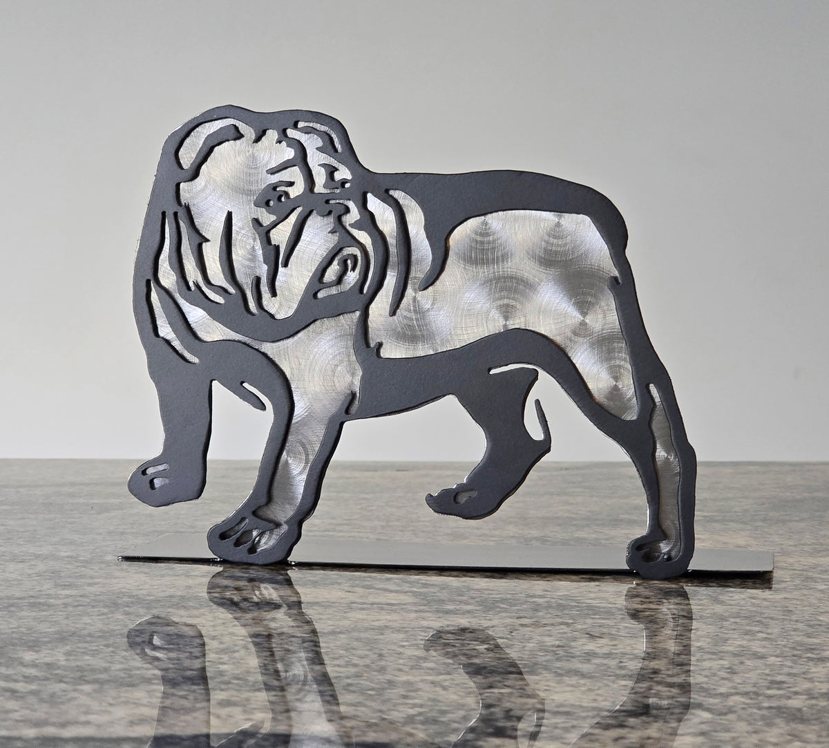 Freestanding metal dog portrait displayed on a tabletop base by Elite Metalworking