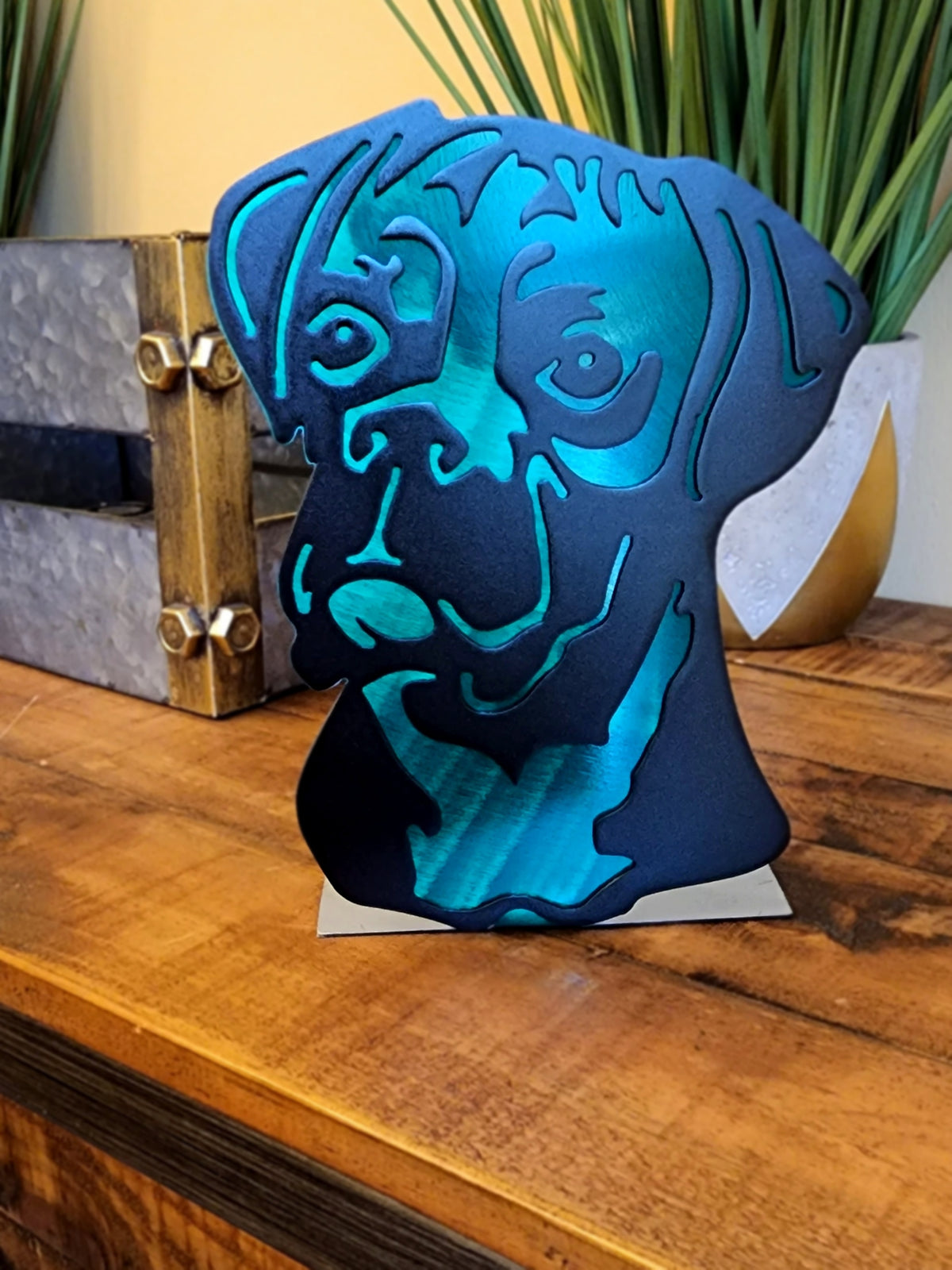 Freestanding metal dog portrait displayed on a tabletop base by Elite Metalworking