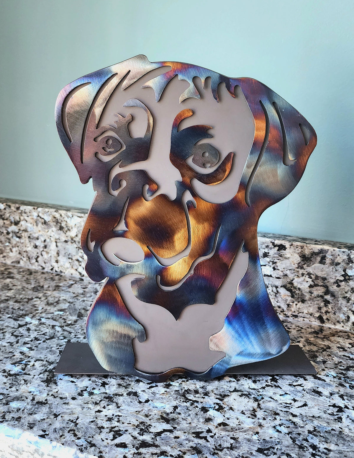 Freestanding metal dog portrait displayed on a tabletop base by Elite Metalworking