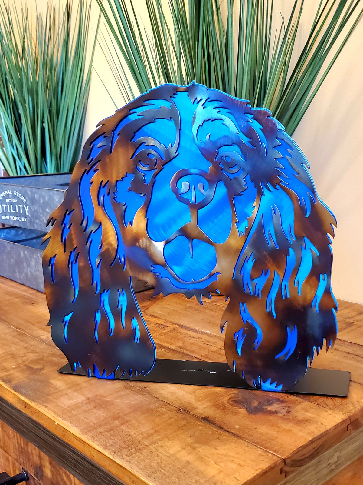 Freestanding metal dog portrait displayed on a tabletop base by Elite Metalworking