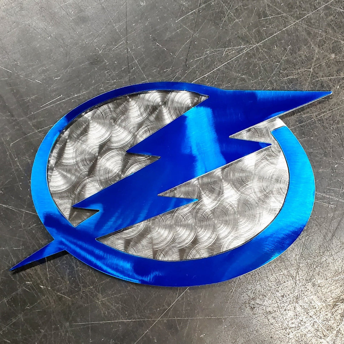 Powder coated sports team metal artwork by Elite Metalworking