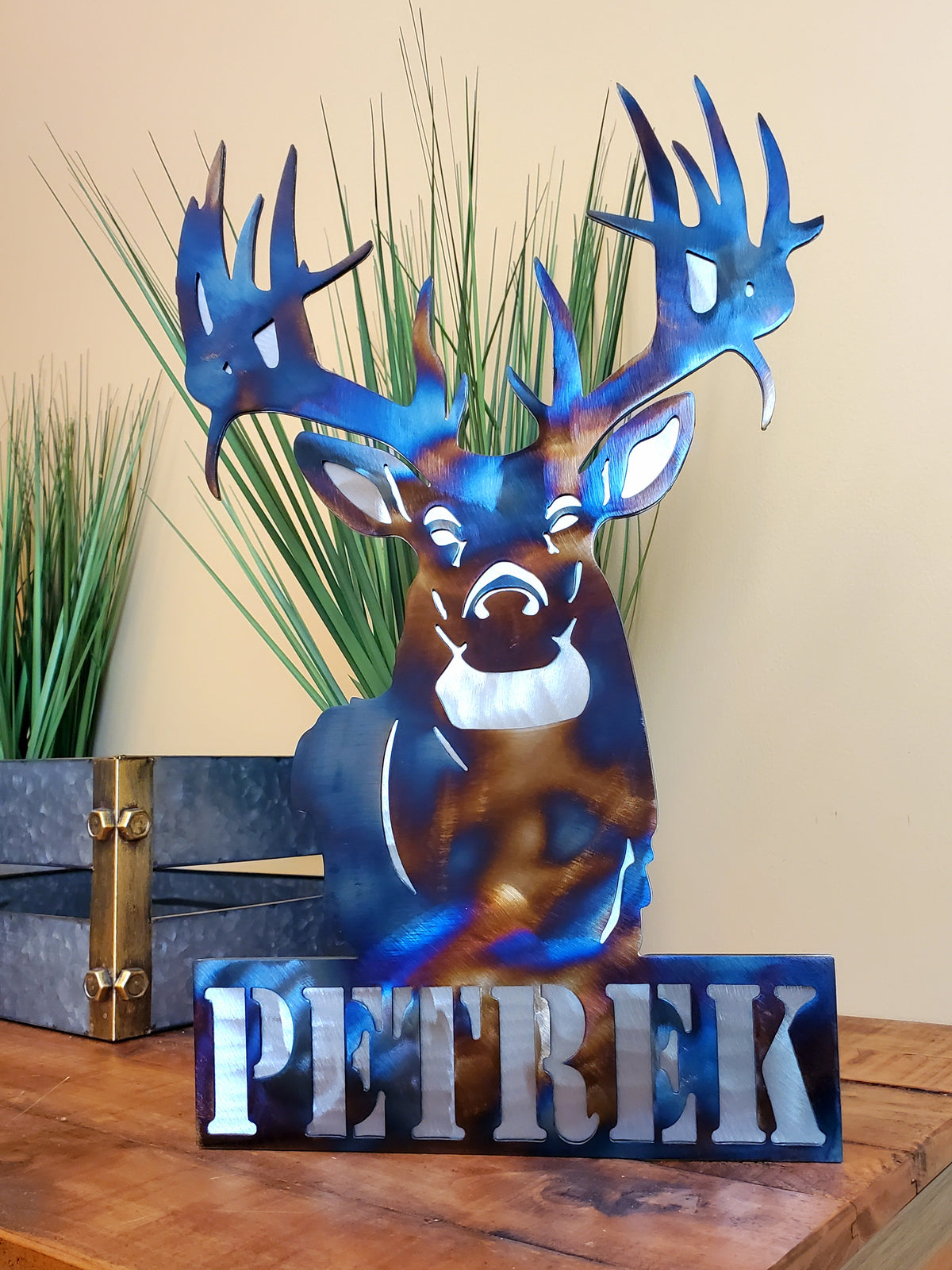 Freestanding metal dog portrait displayed on a tabletop base by Elite Metalworking