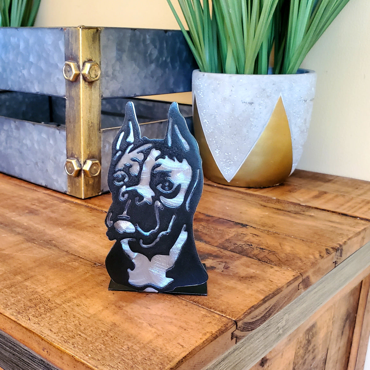 Freestanding metal dog portrait displayed on a tabletop base by Elite Metalworking