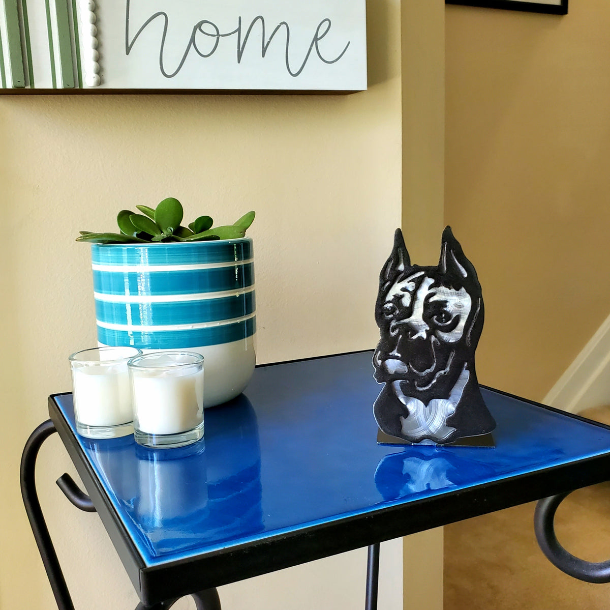Freestanding metal dog portrait displayed on a tabletop base by Elite Metalworking