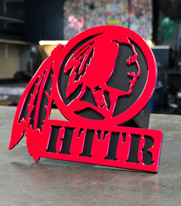 Custom sports trailer hitch cover with powder coated metal finish