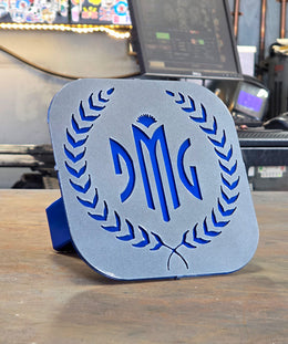 Silver monogram and laurel hitch cover by Elite Metalworking