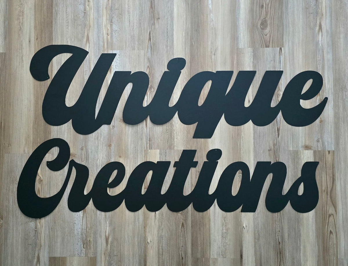Unique Creations script lettering by Elite Metalworking