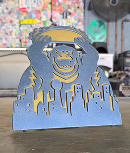 Custom artwork metal hitch cover made by Elite Metalworking