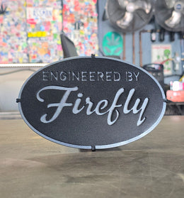 Engineered by Firefly oval hitch cover by Elite Metalworking