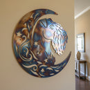 Decorative metal wall art featuring a horse and crescent moon design on a textured surface.