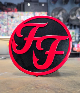 Red circular band logo hitch cover by Elite Metalworking