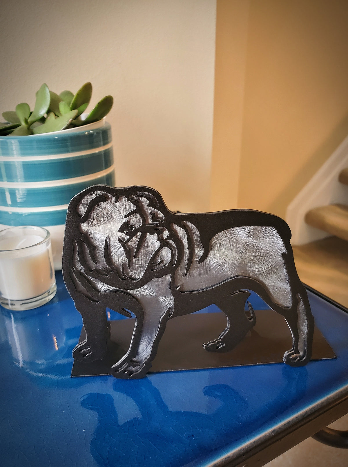 Freestanding metal dog portrait displayed on a tabletop base by Elite Metalworking