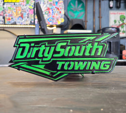 Dirty South Towing green and black hitch cover by Elite Metalworking