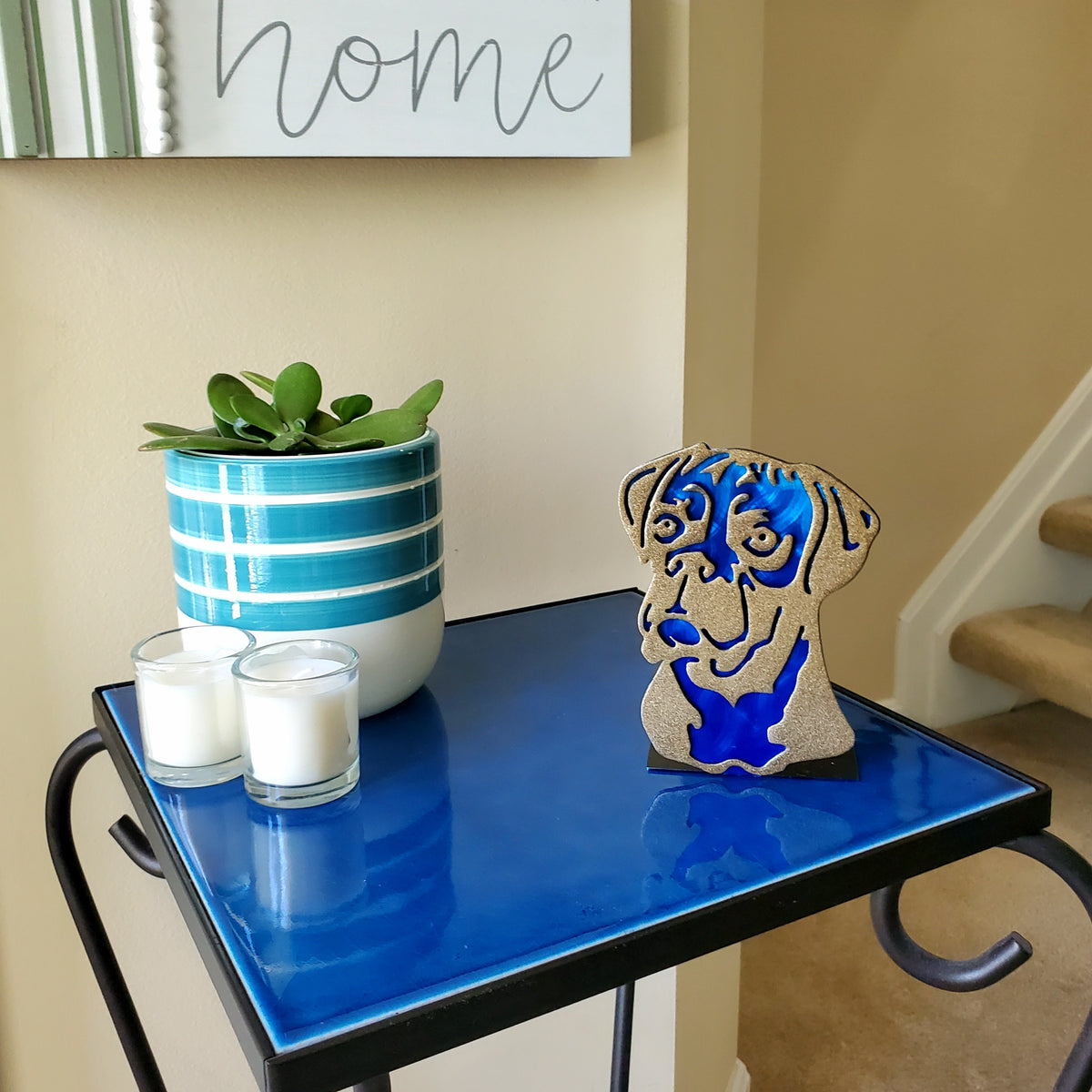 Freestanding metal dog portrait displayed on a tabletop base by Elite Metalworking