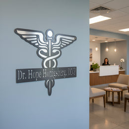 Medical business sign with caduceus by Elite Metalworking