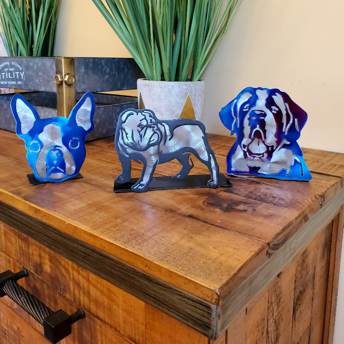 Freestanding dog portrait metal art displayed on a console table by Elite Metalworking