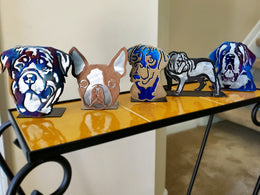 Freestanding dog portraits on display by Elite Metalworking