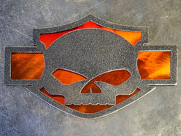 Orange automotive emblem with skull by Elite Metalworking