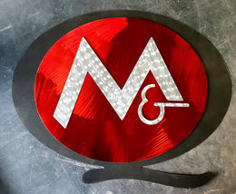 M and Q Packaging circular logo by Elite Metalworking
