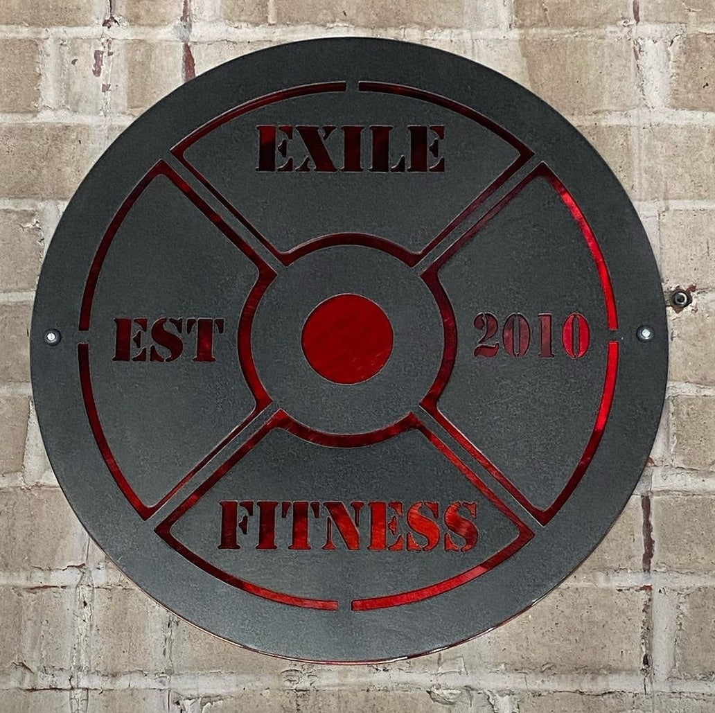 Black and red custom weight plate metal sign for Exile Fitness