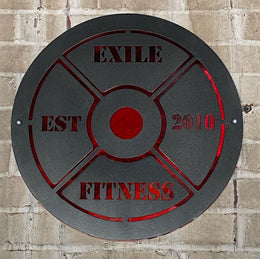 Black and red custom weight plate metal sign for Exile Fitness