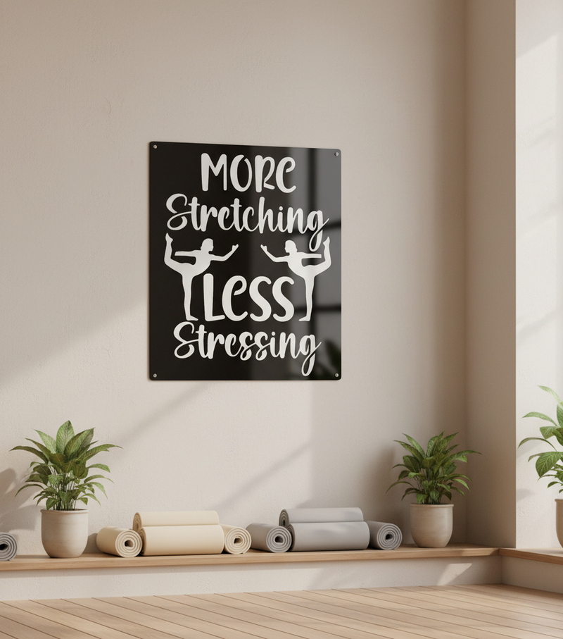 Motivational quote 'More Stretching Less Stressing' with silhouettes of people stretching on a black background.