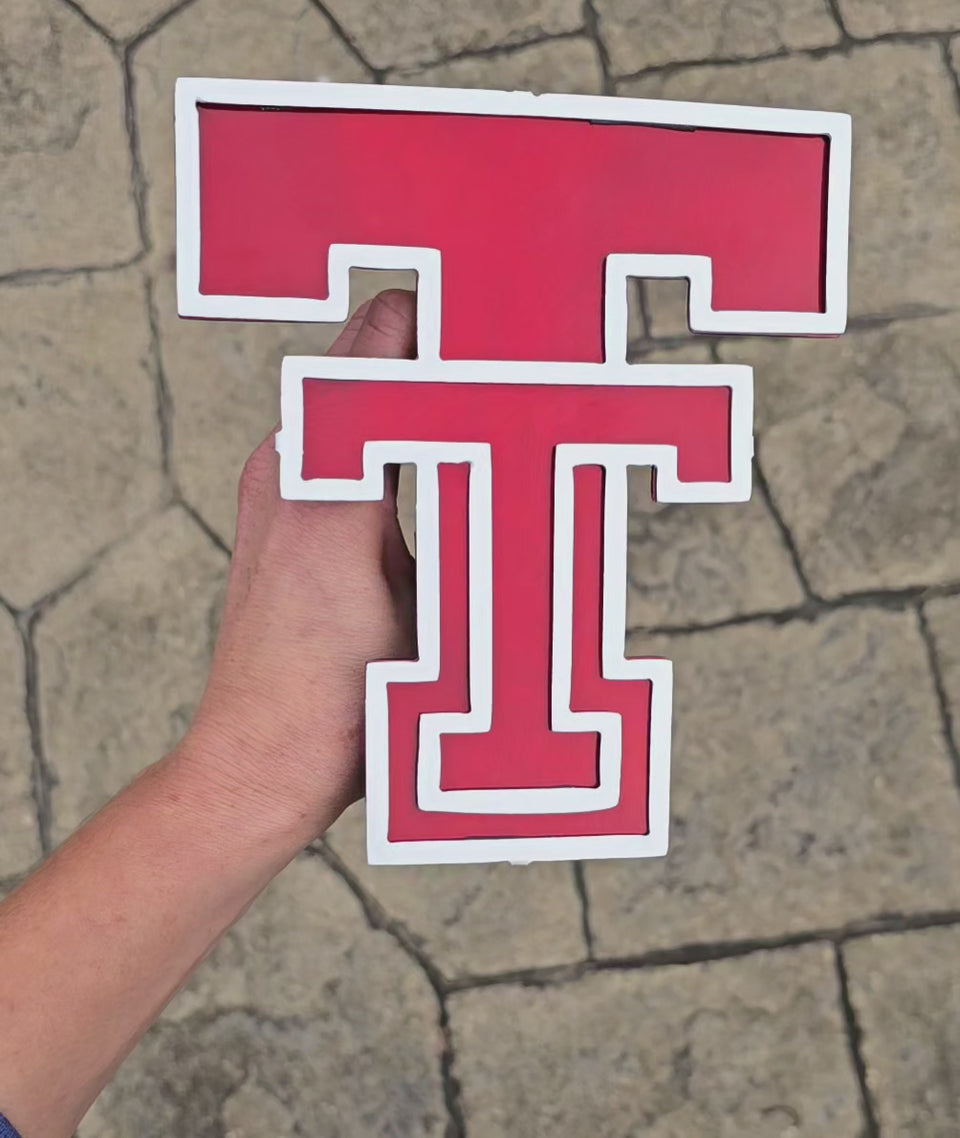 Video showing red college sports monogram hitch cover by Elite Metalworking