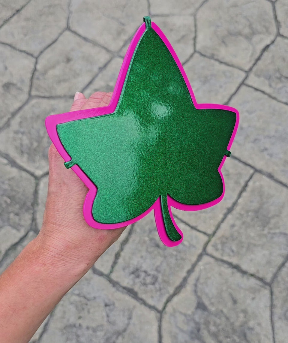 Video showing green and pink leaf hitch cover by Elite Metalworking