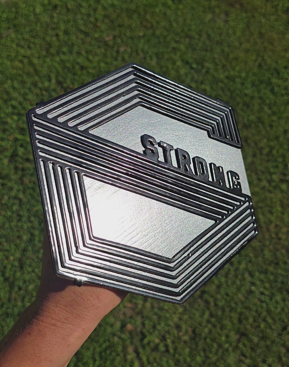 Video showing strong geometric logo hitch cover by Elite Metalworking