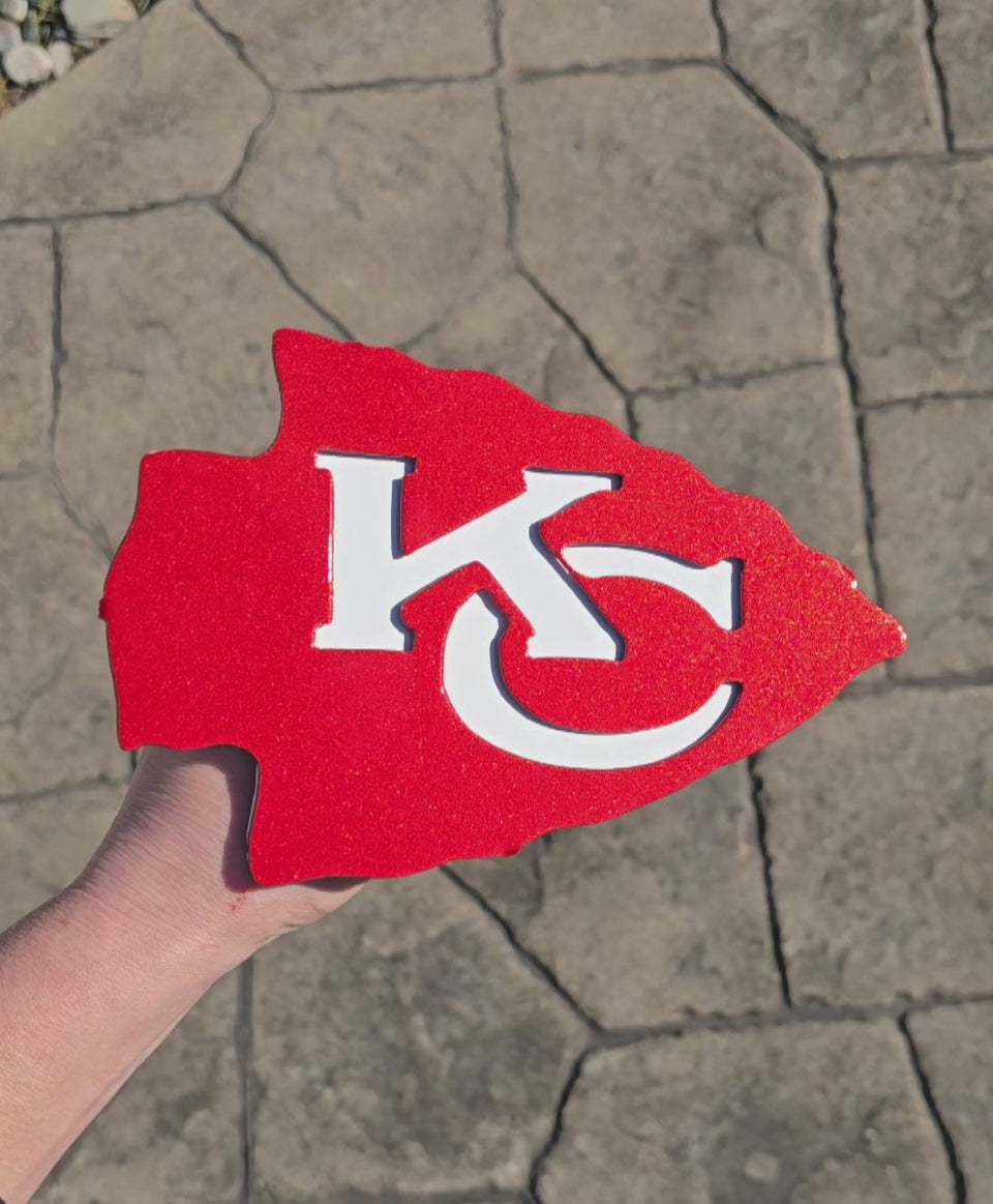 Video showing red football arrowhead hitch cover by Elite Metalworking